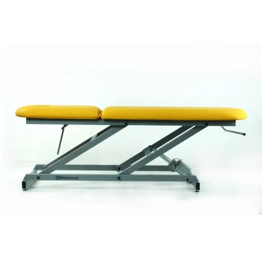 TABLE D'EXAMEN ÉLECTRIQUE AVEC PORTE-ROULEAUX ET BOUCHON FACIAL