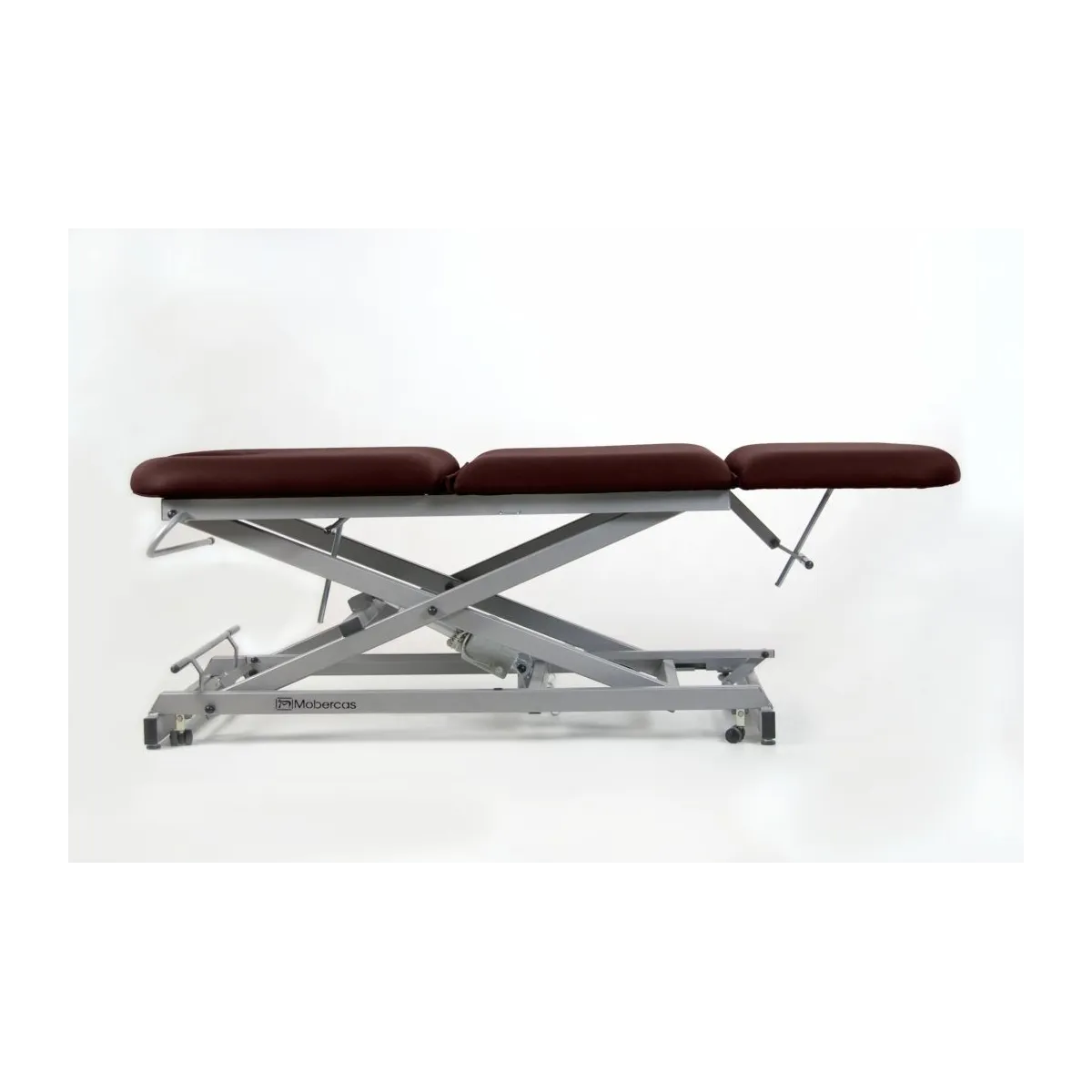 TABLE D'EXAMEN ÉLECTRIQUE 3 PANNEAUX AVEC BOUCHON FACIAL, PORTE-ROULEAUX ET ROULETTES