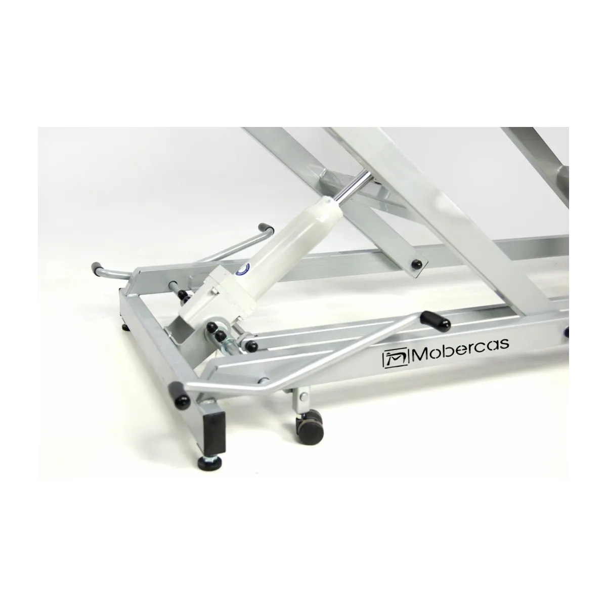 TABLE DIVAN HYDRAULIQUE TYPE FAUTEUIL AVEC PORTE-ROULEAUX, ROULETTES RÉTRACTABLES ET BOUCHON FACIAL