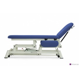 TABLE D'EXAMEN HYDRAULIQUE 2 PLANS AVEC ACCOUDOIRS PLATS, PORTE-ROULEAUX, BOUCHON FACIAL ET ROULETTES RÉTRACTABLES