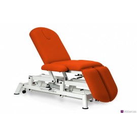 TABLE HYDRAULIQUE AVEC JAMBIÈRES INDÉPENDANTES, ACCOUDOIRS, BOUCHON FACIAL ET ROULETTES RÉTRACTABLES