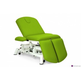 TABLE HYDRAULIQUE AVEC ACCOUDOIRS PLATS, JAMBIÈRES INDÉPENDANTES, BOUCHON FACIAL ET ROULETTES RÉTRACTABLES