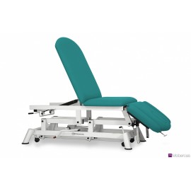 TABLE HYDRAULIQUE AVEC DOSSIER PROCLIVE / DÉCLIVE, ACCOUDOIRS, PORTE-ROULEAUX, BOUCHON FACIAL ET ROULETTES RÉTRACTABLES