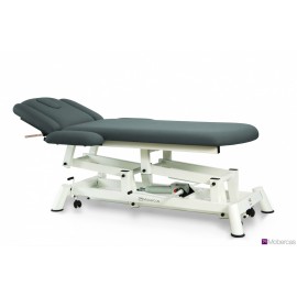 TABLE HYDRAULIQUE AVEC DOSSIER PROCLIVE / DÉCLIVE, ACCOUDOIRS, PORTE-ROULEAUX, BOUCHON FACIAL ET ROULETTES RÉTRACTABLES